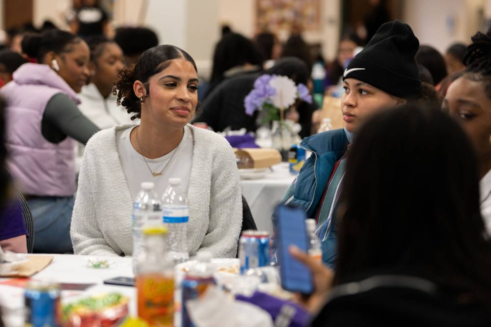 Girls of Color Summit previous event two students having a conversation